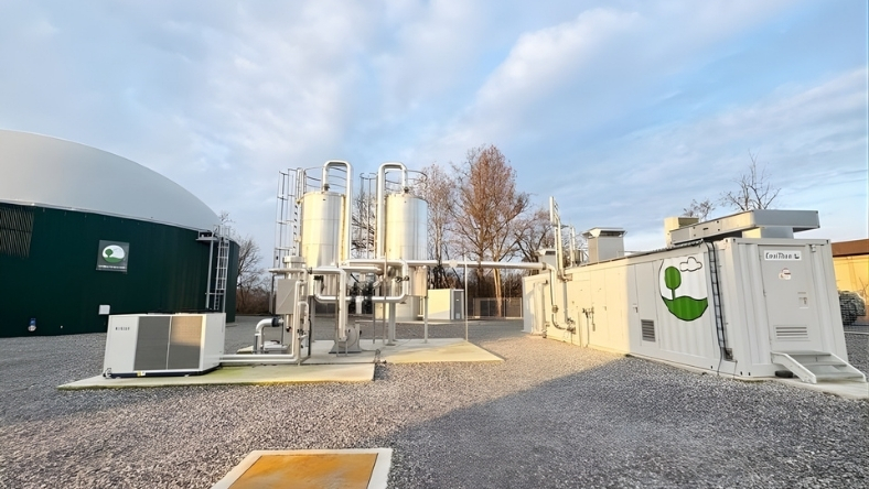 Biomethane production facility with storage tanks and gas processing equipment