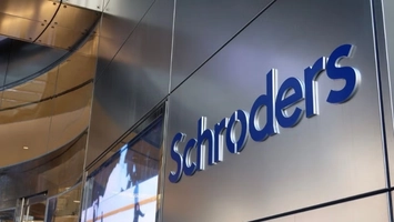 Schroders blue branded sign on a reflective steel building facade with curved glass interior visible behind